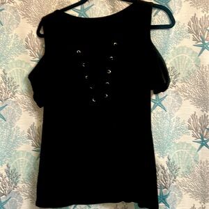 Black top size large with half sleeves and lace up in front.